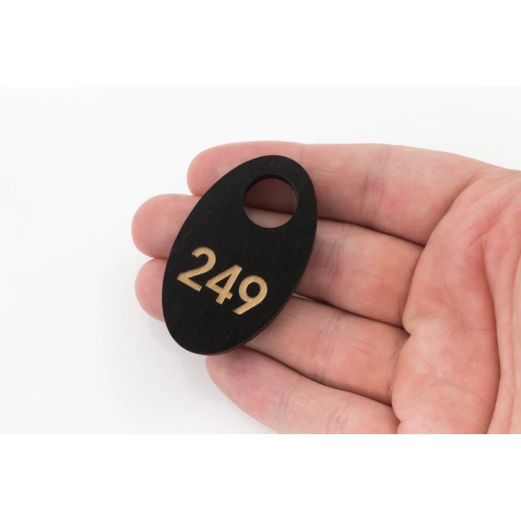 Brelok drewniany Owal mini 5 - kolor wenge wym. 30x50mm - BD034