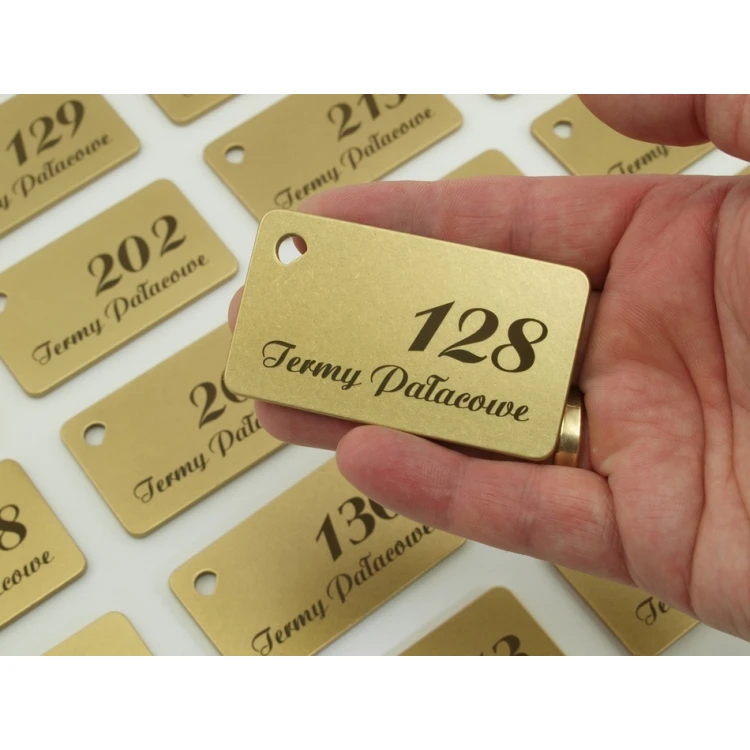 Brelok hotelowy -  Gold Sunshine 70x40mm - BMZ006