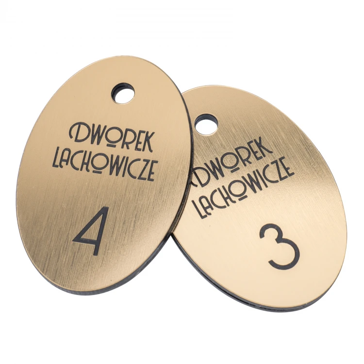 Brelok hotelowy - Oval Metalic Gold - wym. 60x40mm - BRL028 