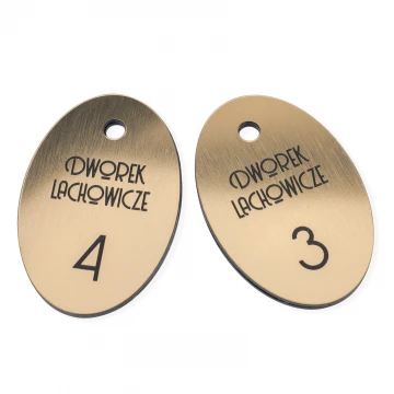 Brelok hotelowy - Oval Metalic Gold - wym. 60x40mm - BRL028 