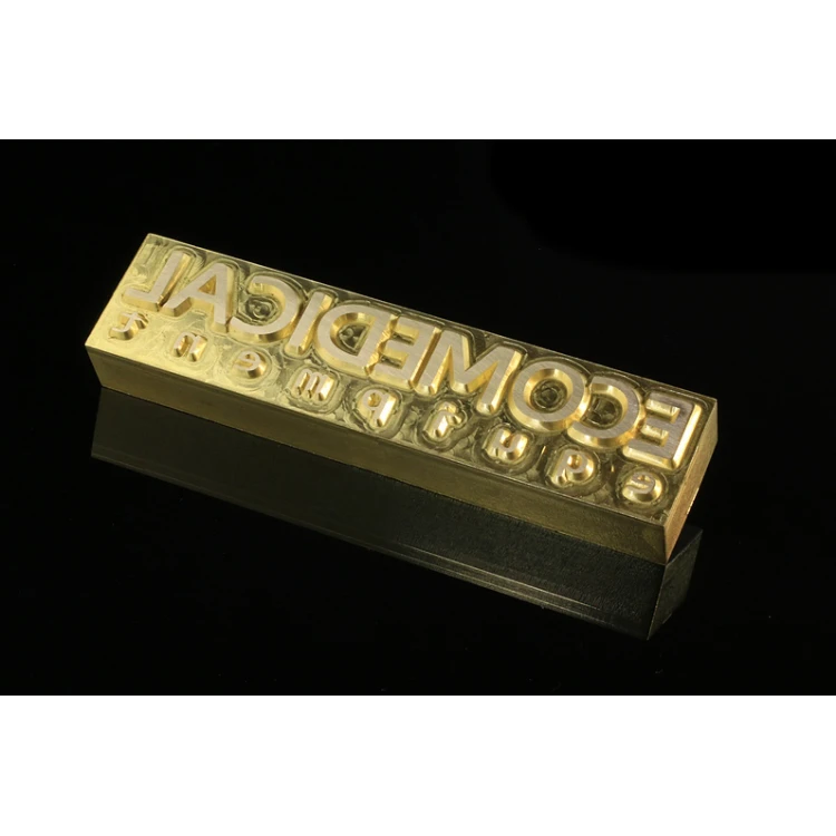Gorący stempel do wyciskania logotypu na gorąco i zimno - wymiary matrycy: 105x25mm - CNC