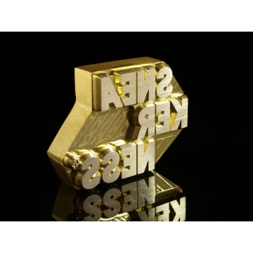 Gorący stempel do wyciskania logotypu na gorąco i zimno - wymiary matrycy: 56,9x43mm - CNC