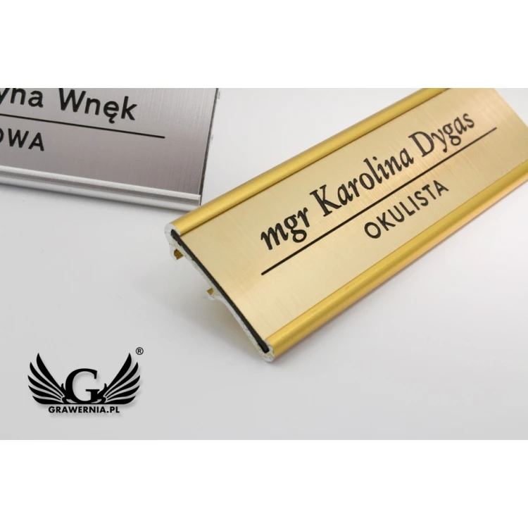 Identyfikator aluminiowy z wymienną grawerowaną tabliczką - 70x20mm - ID061