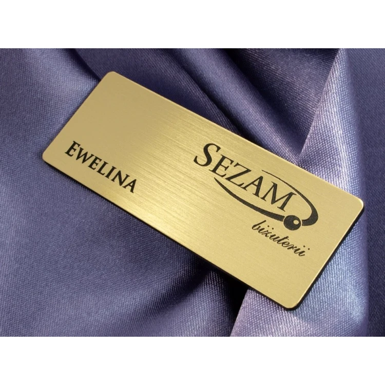 Identyfikator dla pracownika - Złoty z czarnym grawerem - 66x26mm - rogi zaokrąglone - ID019