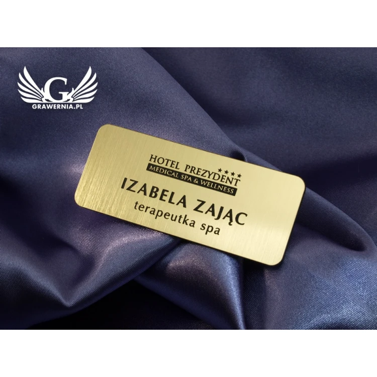 Identyfikator dla pracownika - Złoty z czarnym grawerem - 66x26mm - rogi zaokrąglone - ID019