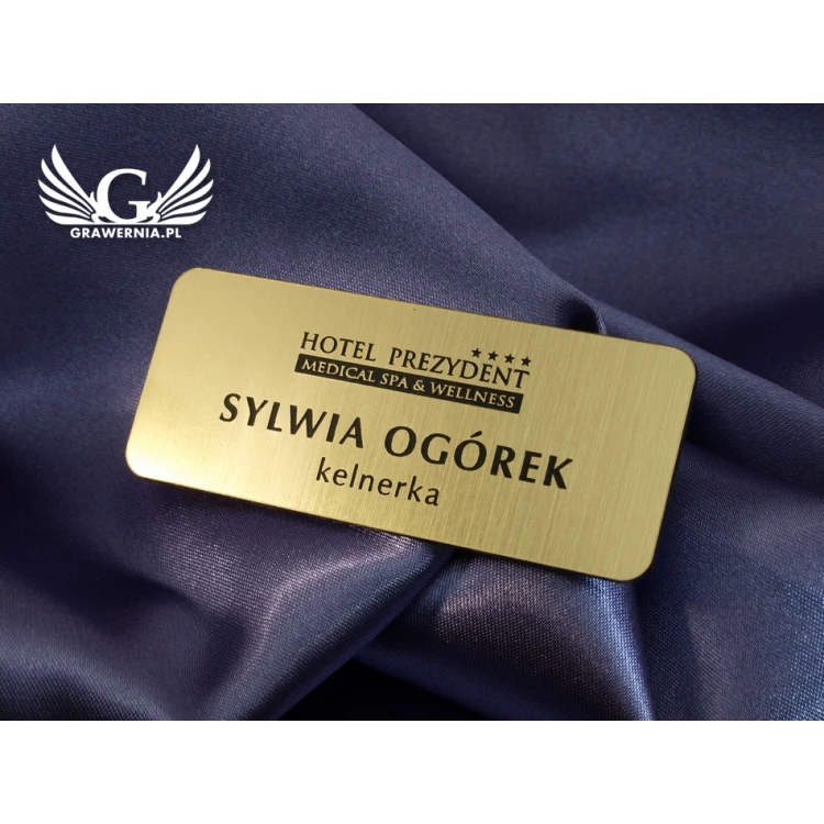 Identyfikator dla pracownika - Złoty z czarnym grawerem - 66x26mm - rogi zaokrąglone - ID019