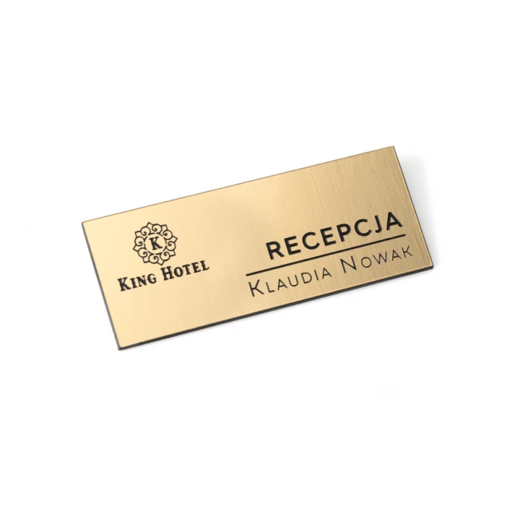 Identyfikator dla pracownika - złoty lub srebrny laminat z czarnym grawerem - 75x30mm - ID016