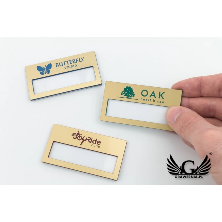 Identyfikator z okienkiem - złoty z kolorowym grawerem - M - wym. 67x35mm - ID073