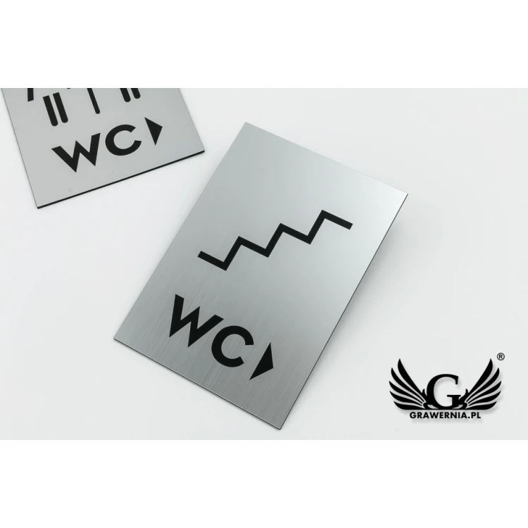 Tabliczki kierunkowe na ścianę - toalety - srebrny lub złoty laminat - wym. 100x140mm - TT020
