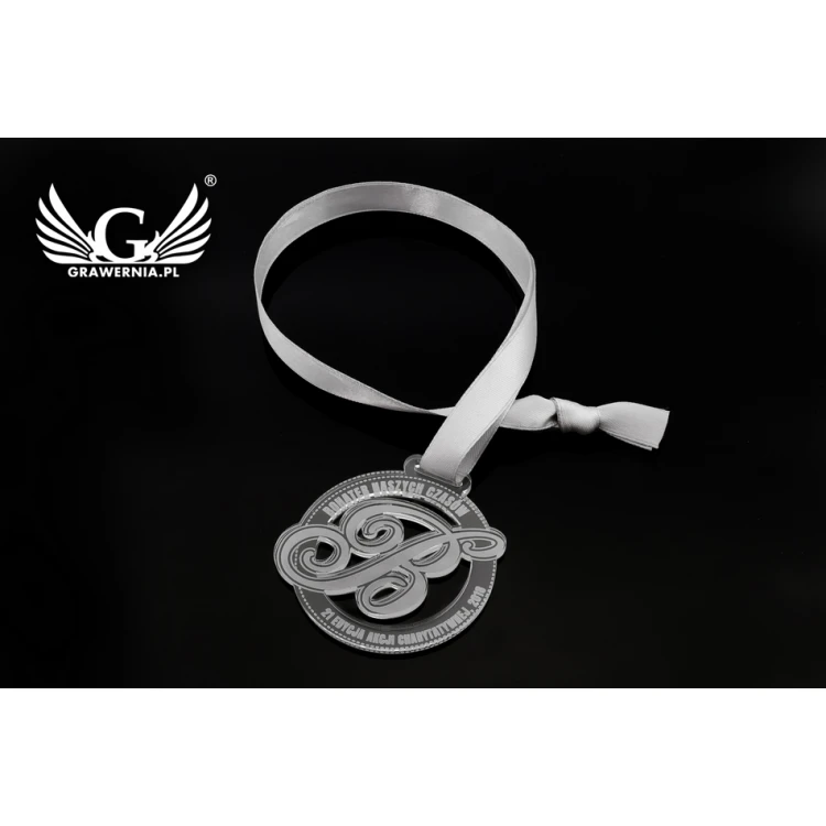 Medal akrylowy grawerowany laserem - średnica: 60mm - gr. 3mm - MGR046