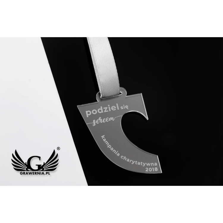 Medal akrylowy grawerowany laserem - wymiary: 45x55mm - gr. 3mm - MGR050