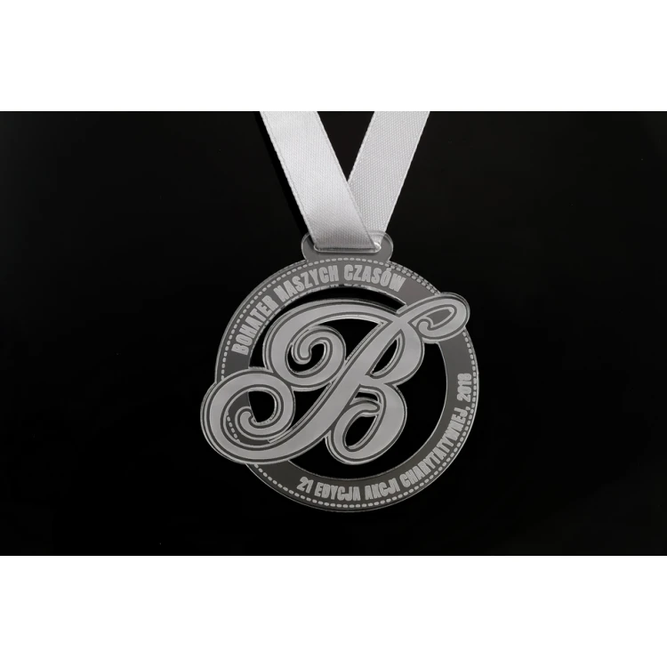 Medal akrylowy grawerowany laserem - średnica: 60mm - gr. 3mm - MGR046