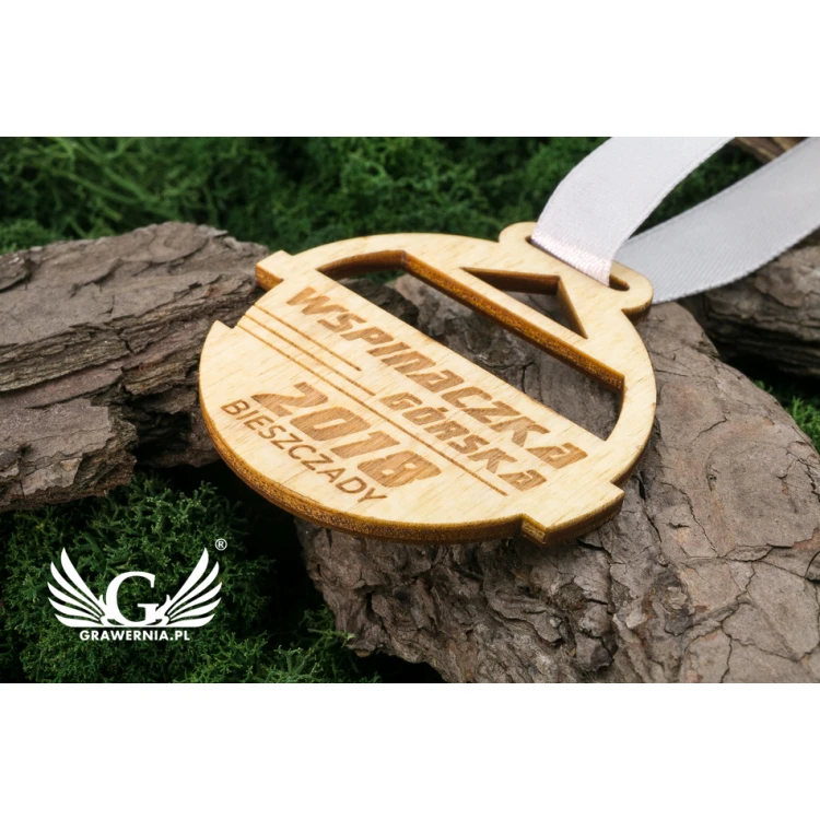 Medal drewniany grawerowany laserem - wymiary: 55x50mm - gr. 3mm - MGR036