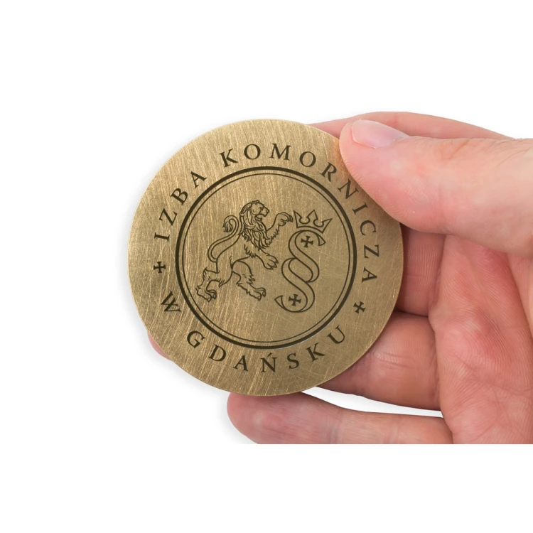 Medal z mosiądzu w kasetce drewnianej