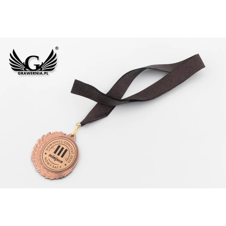 Medal metalowy z grawerowanym emblematem - średnica 70mm - MMC7010