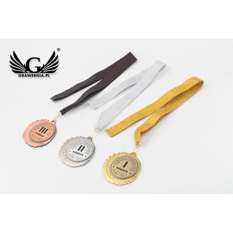 Medal metalowy z grawerowanym emblematem - średnica 70mm - MMC7010