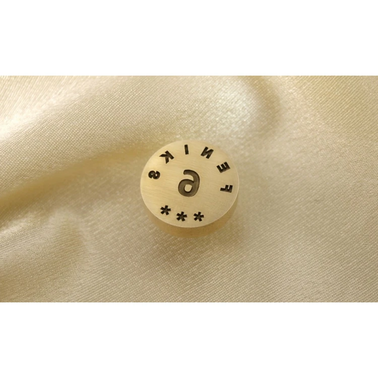 Referentka z mosiądzu - Laser - średnica 20mm