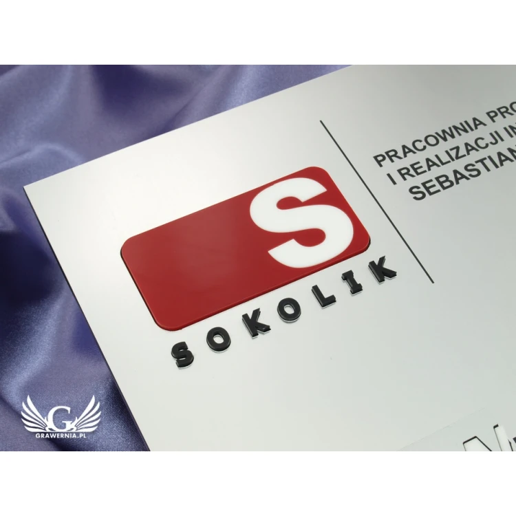 Szyld - dwa wypukłe loga - SZ043 - wym. 275x250mm