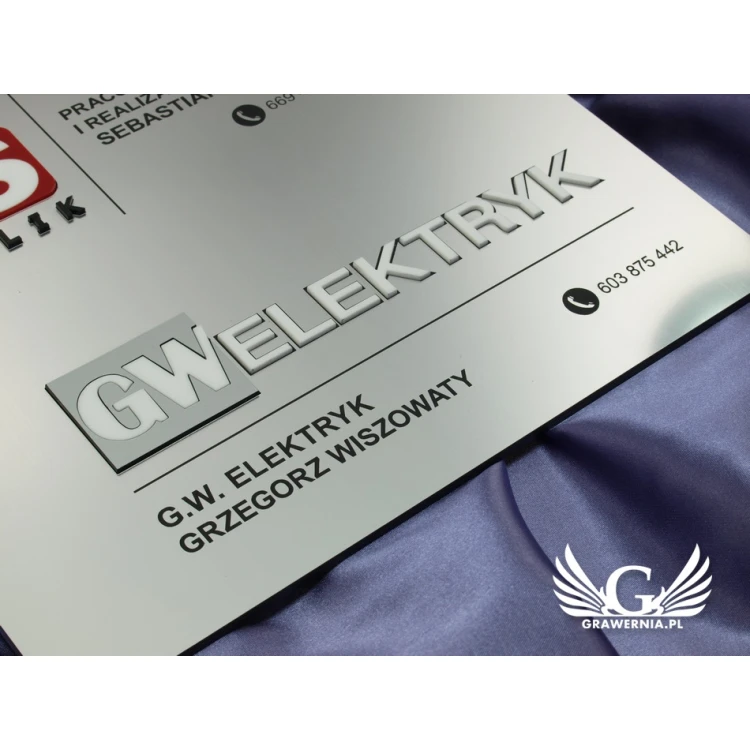Szyld - dwa wypukłe loga - SZ043 - wym. 275x250mm