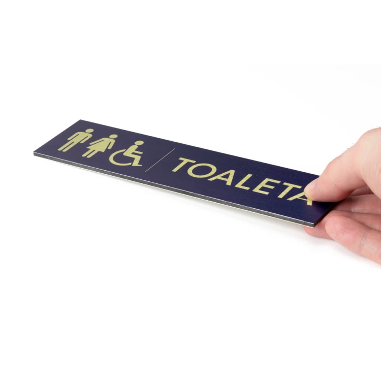 Tabliczka na toalety koedukacyjne - złoty dibond z nadrukiem UV - wym. 200x50mm - TT040