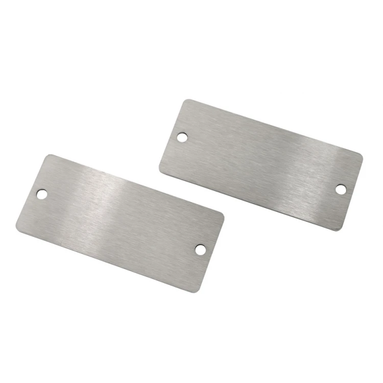 Tabliczka stalowa z dowolnym grawerem - wym. 52x23x1mm - TS050