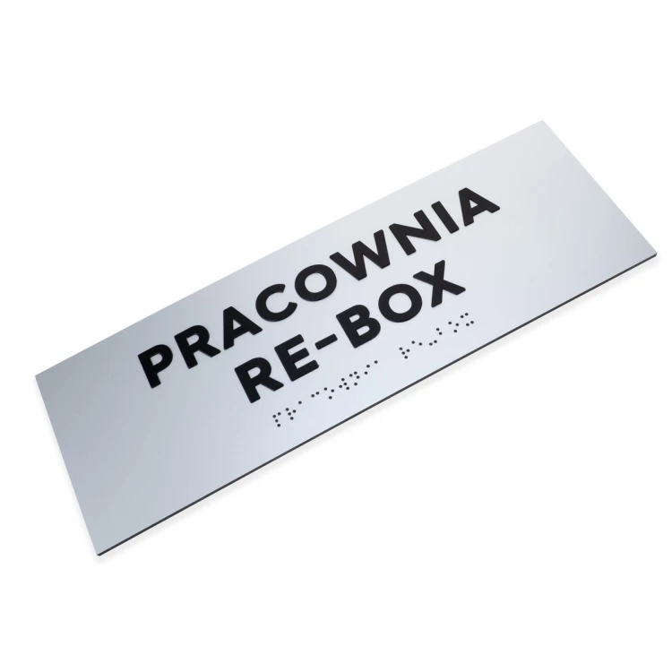Tabliczka z wypukłymi literami i pismem Braille'a - laminat srebrny - wym. 295x100mm - TAB498