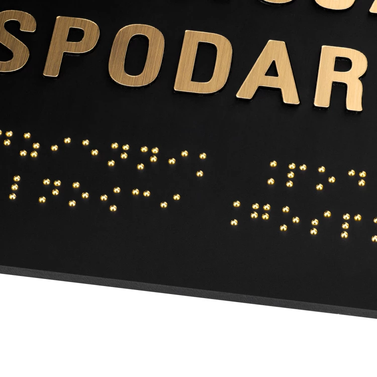 Tabliczka z pismem Braille'a - czarny matowy akryl i złote wypukłe litery - wym. 310x180mm - TAB603