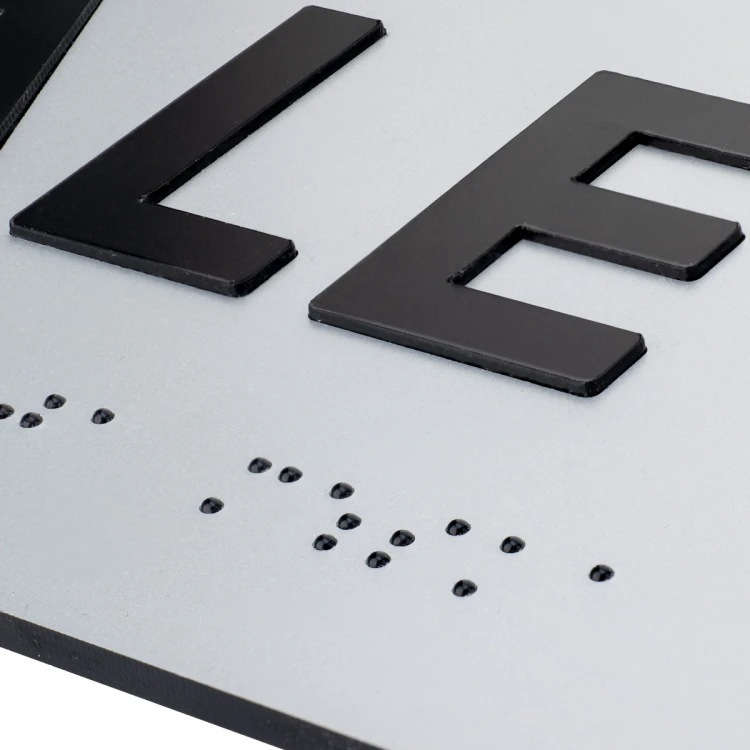 Tabliczka z wypukłymi literami i pismem Braille'a - Toaleta damska - laminat srebrny - wym. 295x100mm - TAB504
