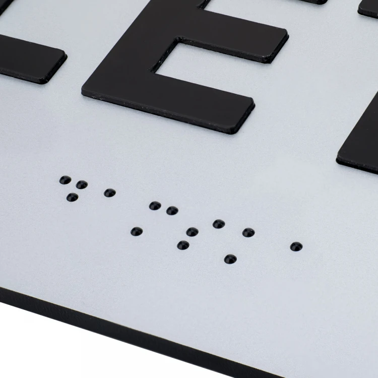 Tabliczka z wypukłymi literami i pismem Braille'a - Toaleta męska - laminat srebrny - wym. 295x100mm - TAB505
