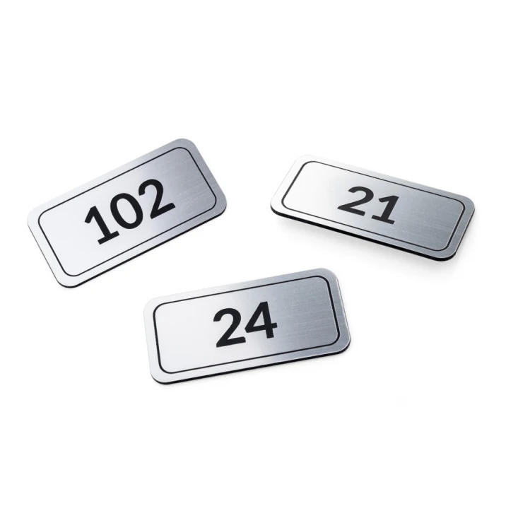 Tabliczki z numeracją na drzwi, szafki i szuflady - srebrny laminat grawerski - ND031 - wym. 70x35mm 
