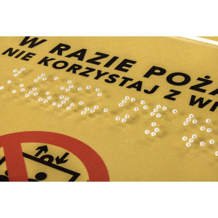 W razie pożaru nie korzystać z windy - tabliczka z plexi z pismem Braille'a - wym. 180x230mm - TAB270